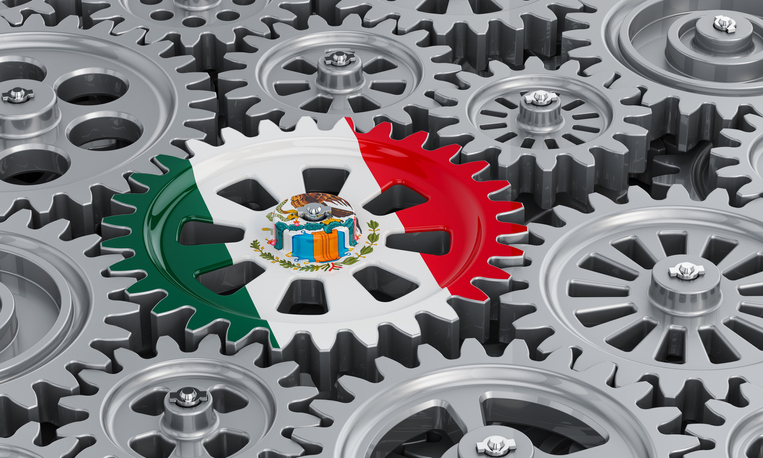Mexican flag on the gearwheel, business industrial concept. 3D rendering